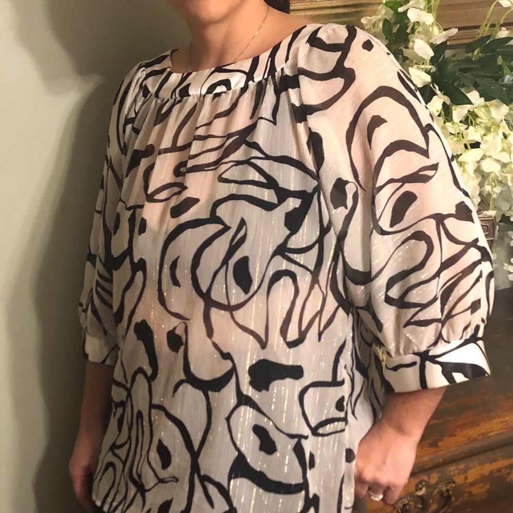 3 for $20 & 15%-Dressy top with gold accent print